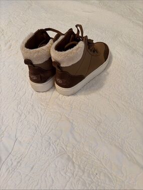 UGG women’s Brown Faux-Shearling High-Top Boots